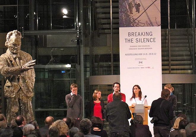 Members of Breaking the Silence at the exhibition opening in Berlin.