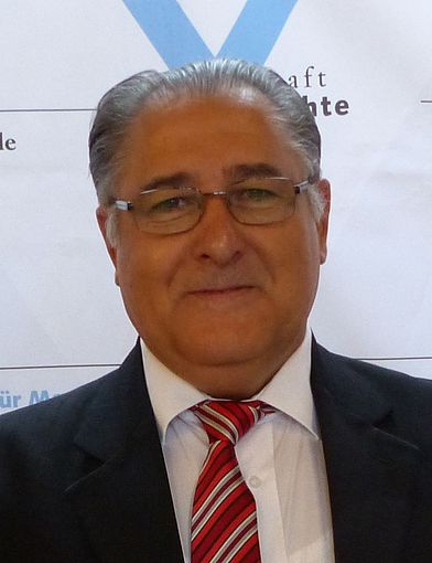 Dr. Kamal Sido