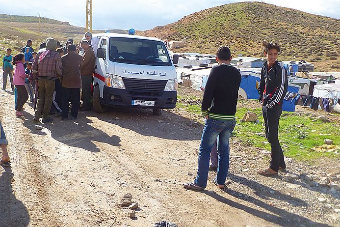 Verteilung von Hilfsgütern in kurdischen Gebieten in Syrien.